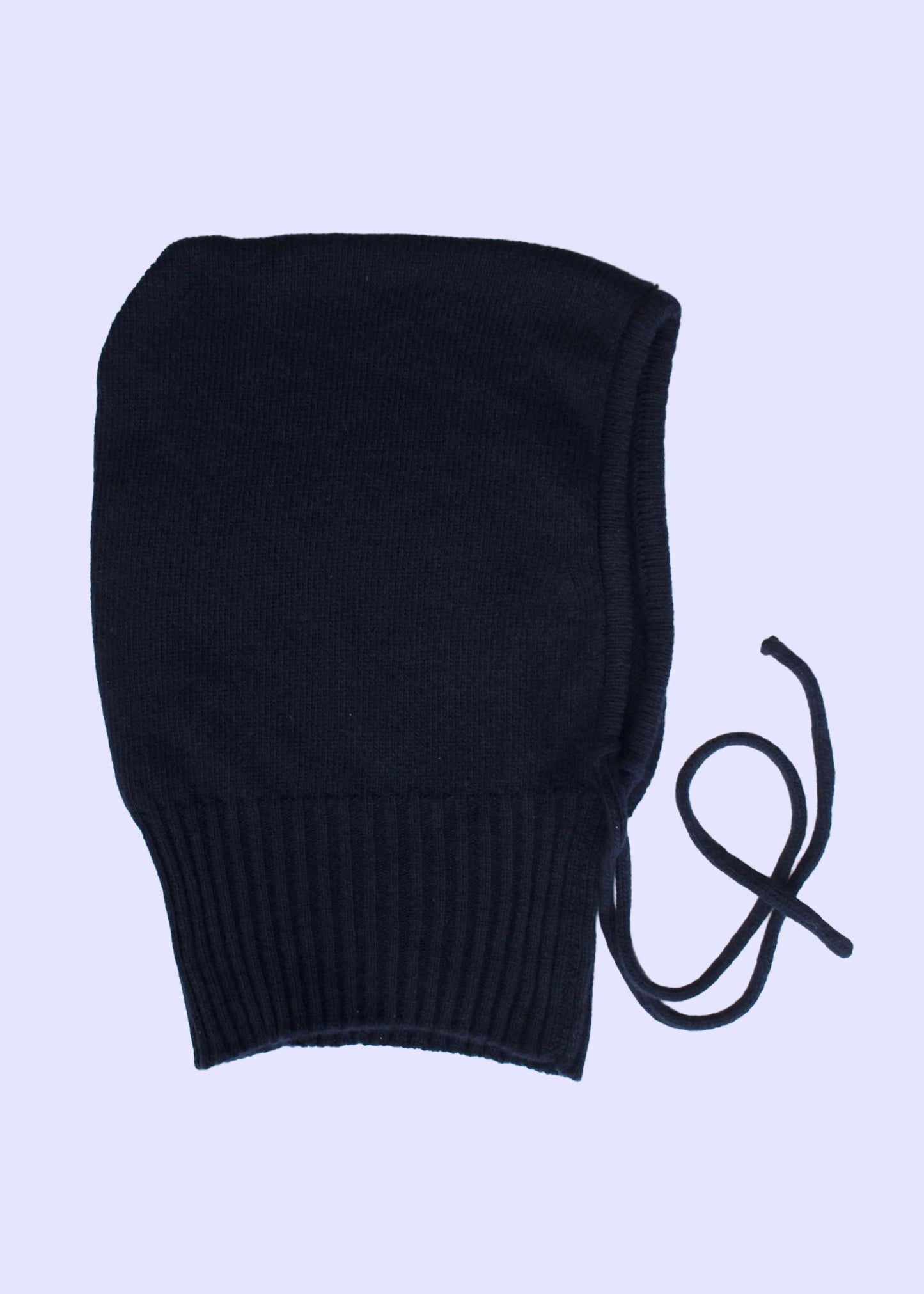 Navy knit balaclava on a light purple background