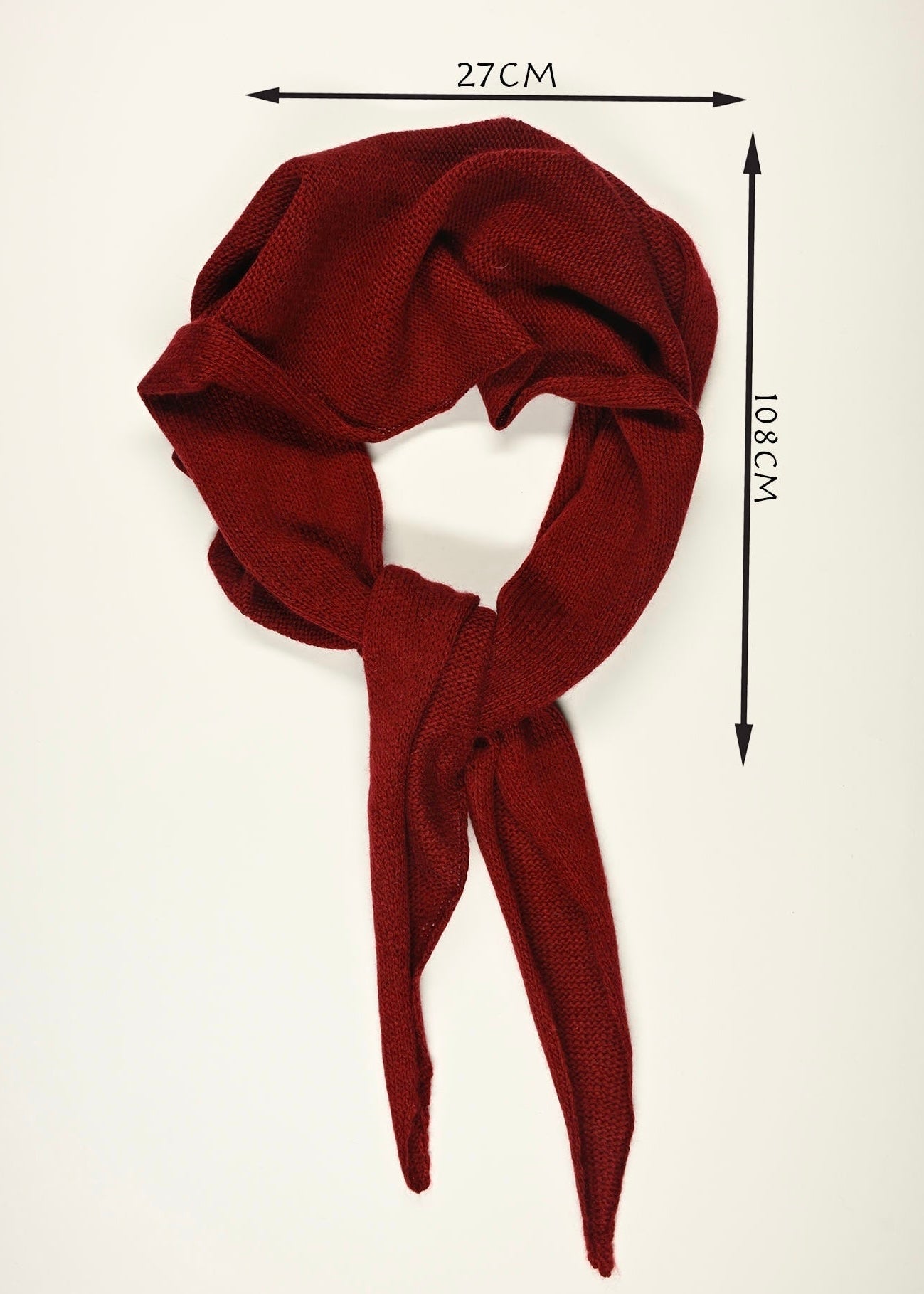 Red scarf with measurements of 108cm Long by 27cm Wide  on a white background