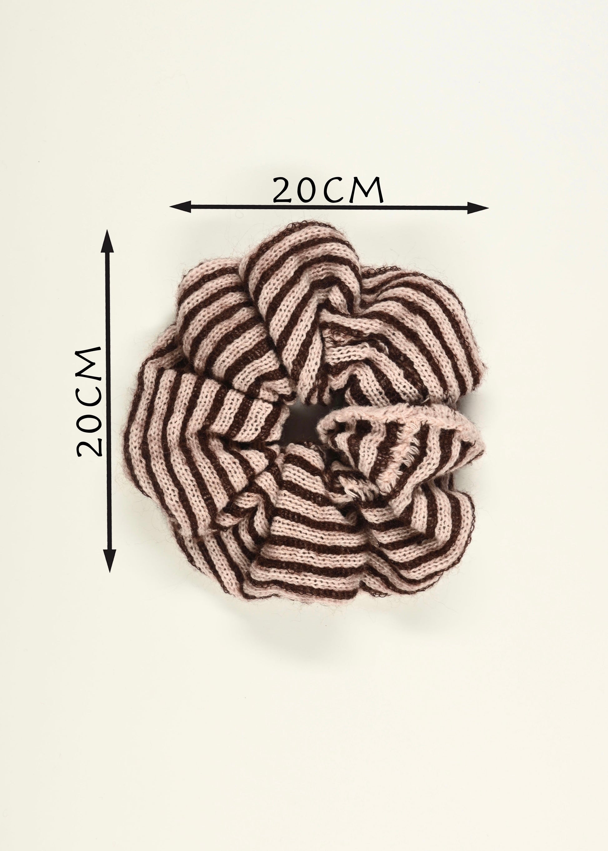 Knitted pink and plum striped scrunchie with dimensions labeled on a white background, 20cm L by 20cm W