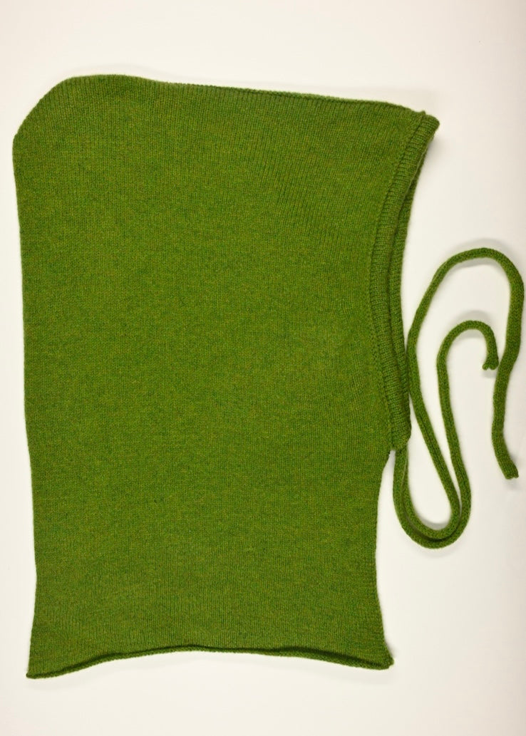 A flat lay of our cashmere knitted balaclava hood in green with a white background 